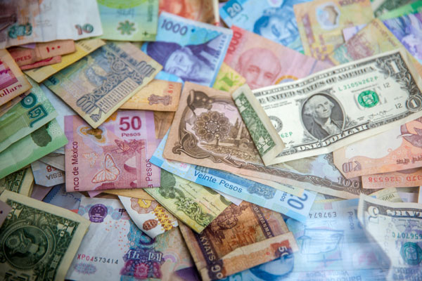 stack of dollar euro and rupiah